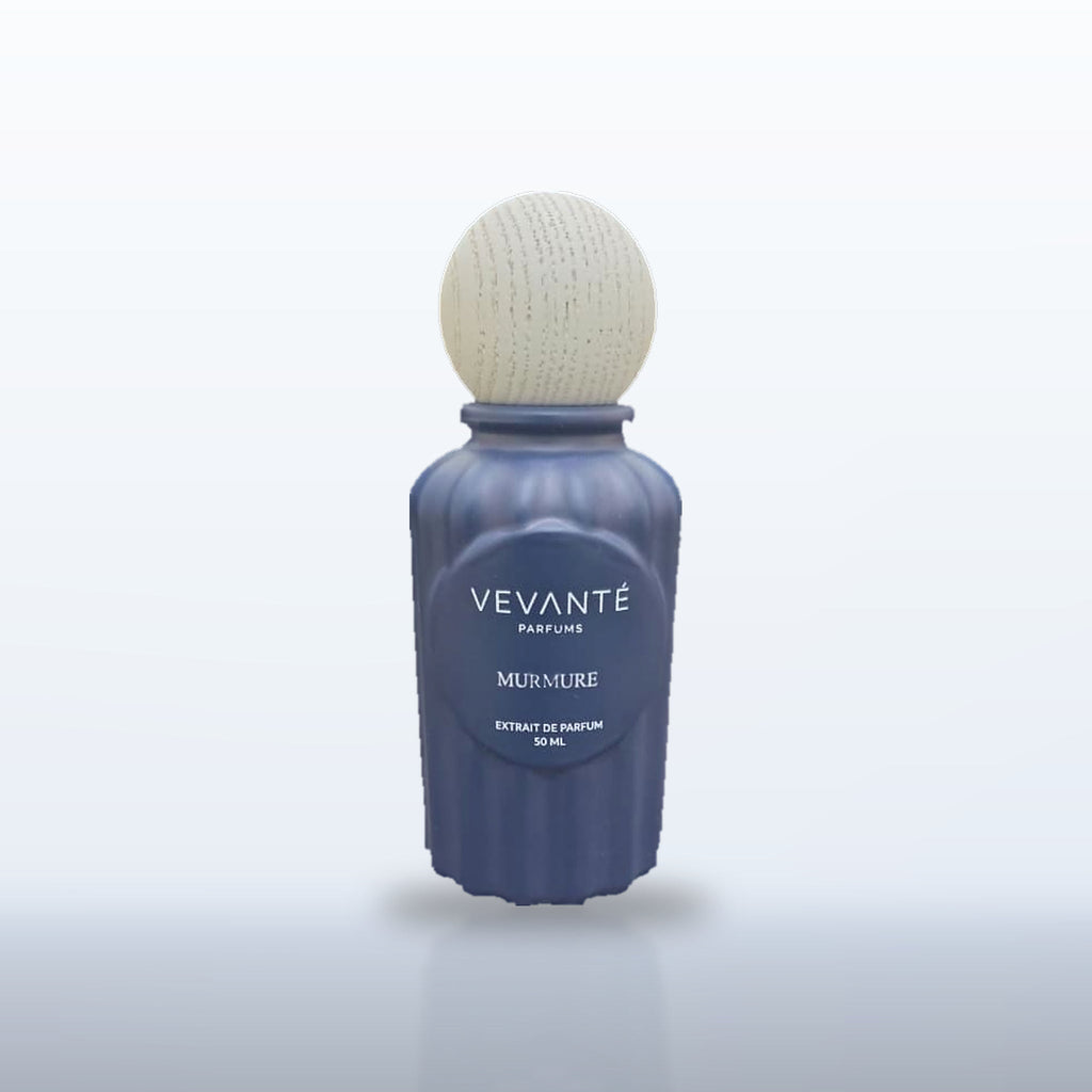 Vevanté Murmure 50 ml Extrait de Parfum on a soft navy studio backdrop