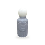 Vevanté Velours 50 ml Extrait de Parfum — matte dove grey bottle with wooden sphere cap