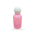 Vevanté Voile 50 ml Extrait de Parfum — matte rose pink bottle with wooden sphere cap